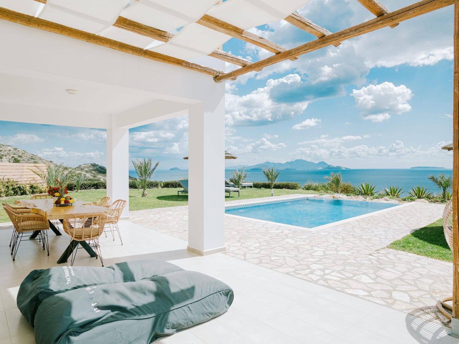 Villa Afrodite pergola lounge and pool with Aegean view