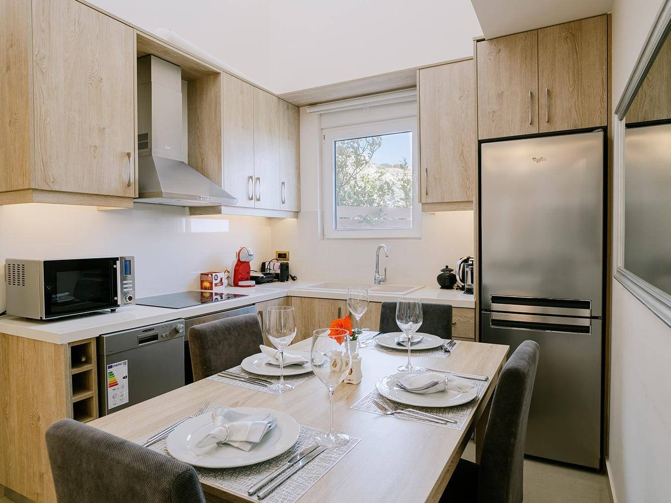 Villa Afrodite fully equipped kitchen and dining table
