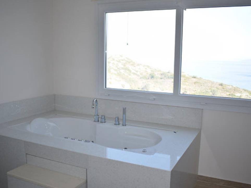 Villa Apollon jacuzzi with sea-view window