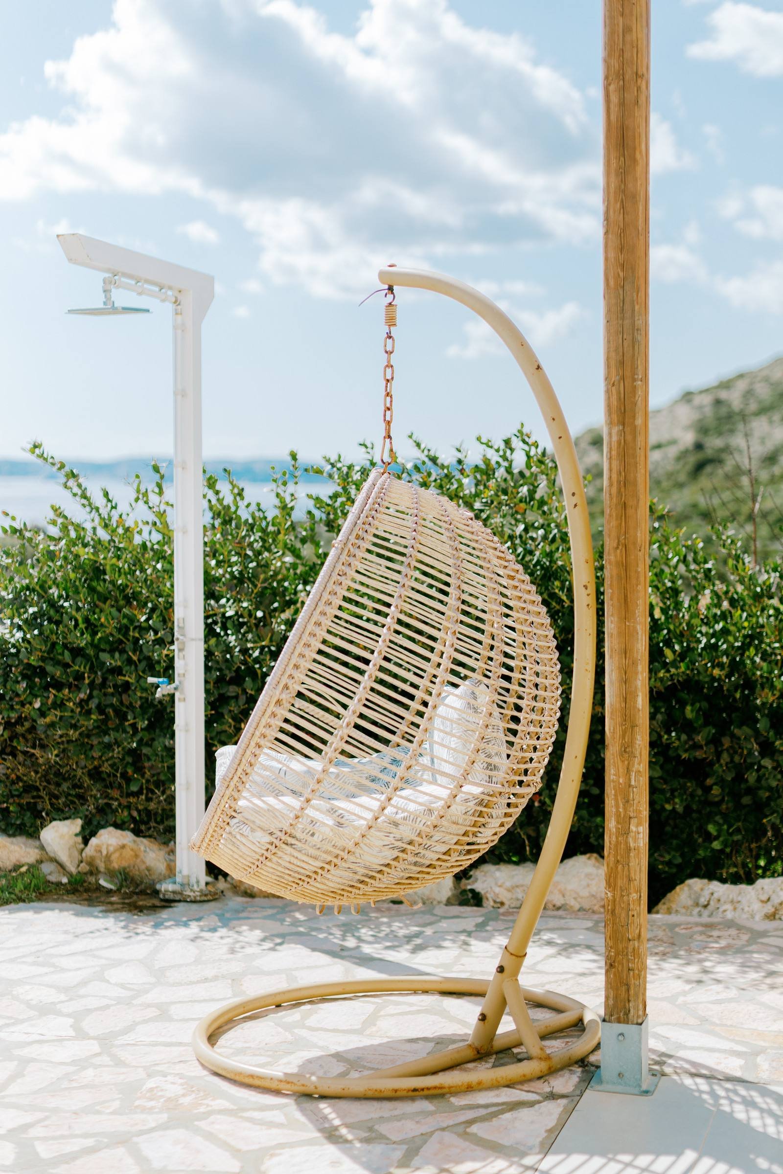Hanging egg chair on the terrace